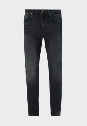 Jeans negre slim-fit, uzate, cu buzunare frontale, curea și închidere cu nasture, expuse pe un fundal simplu de culoare deschisă.