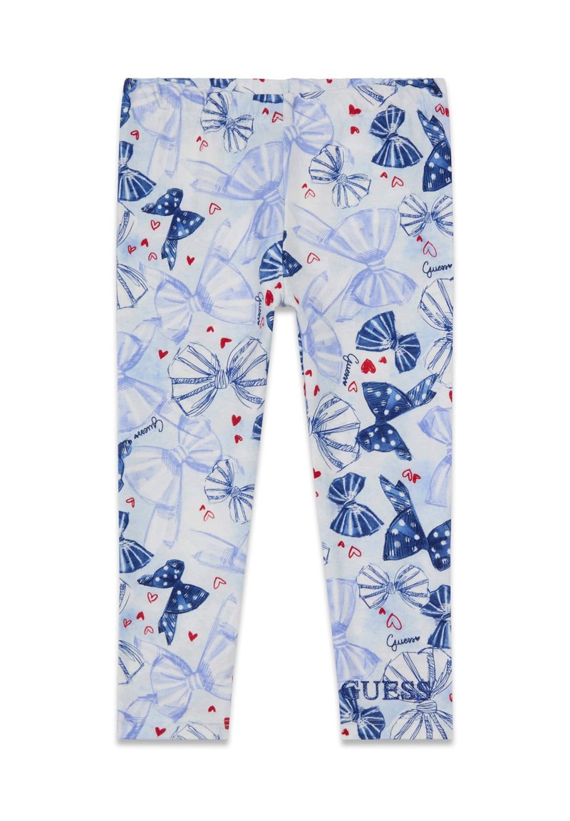 Leggings avec un fond bleu clair orné de divers nœuds bleus et cœurs rouges, taille élastique et logo "GUESS" en bas.