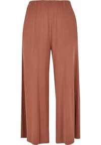 Pantalon large et ample de couleur marron clair uni avec une ceinture élastique, fabriqué en tissu doux et fluide.