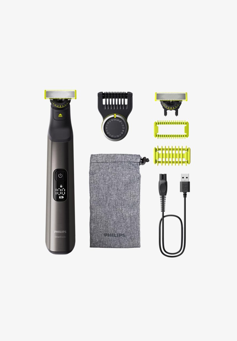 Philips OneBlade scheerapparaat met grijze behuizing, groene accenten, digitaal display, twee opzetstukken, verstelbare lengtedial, USB oplaadsnoer en stoffen etui.