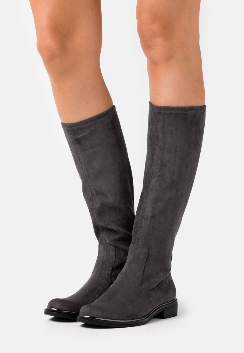 Gray knee-high boots in soft suede with a flat heel, featuring a sleek design and subtle stitching details along the seams.