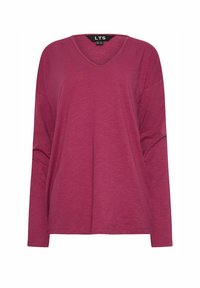 Długi rękaw, bluzka z dekoltem w kształcie litery V w głębokim kolorze mauve. Wykonana z miękkiego, lekkiego materiału o luźnym kroju i delikatnej teksturze. Widoczna metka marki.