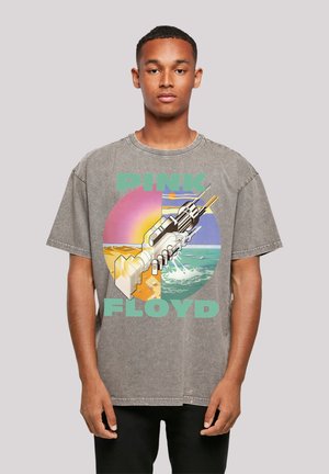 Graues, übergroßes Baumwoll-T-Shirt mit einem bunten Grafikdesign, das eine Gitarre vor einem Sonnenuntergang und Ozeanhorizont zeigt, mit dem Text "PINK FLOYD."