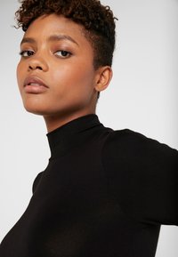 Gina Tricot DORSIA - Camisola de manga comprida - black