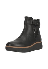 Bottes noires en cuir, à la cheville, avec un bout arrondi, dotées d'une sangle latérale et d'une boucle, finitions texturées et semelle en caoutchouc légèrement surélevée.