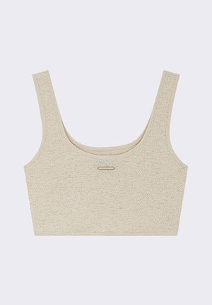 Bralette beige corto con spalline larghe, texture a costine e scollatura a barchetta. Presenta un sottile dettaglio metallico al centro davanti.