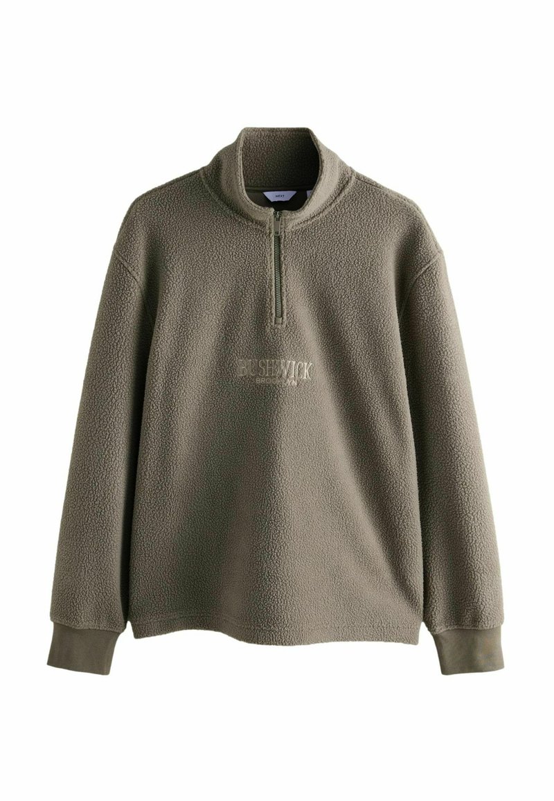 Pullover in pile verde oliva con colletto a mezza zip. Presenta un logo discreto sulla parte anteriore e una superficie testurizzata. Maniche lunghe con polsini aderenti.