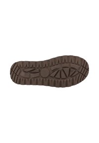 Brown rubber shoe sole with deep tread patterns, including oval and triangular shapes, providing traction and durability.