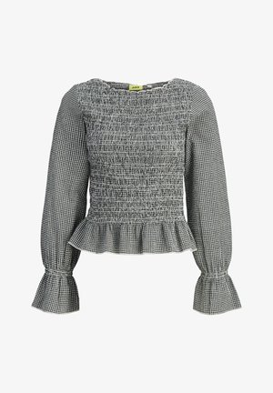 Blouse à manches longues en vichy noir et blanc avec corsage froncé, ourlet et poignets à volants, et col rond.