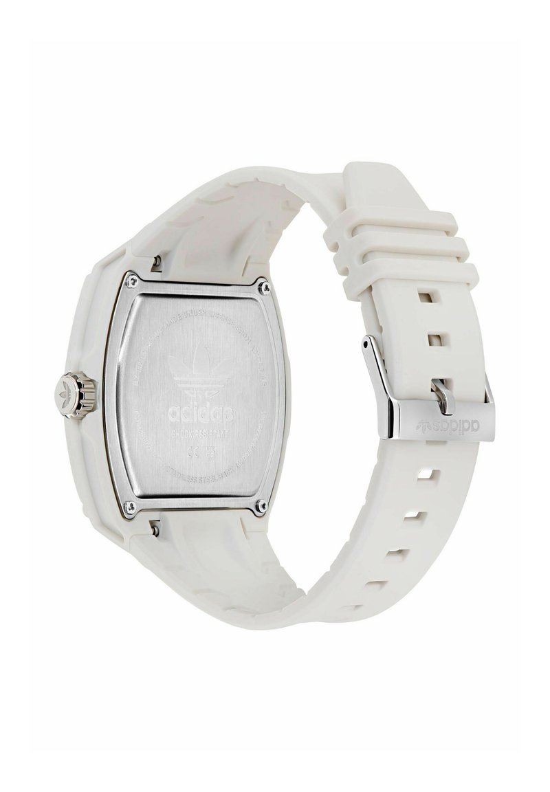 Orologio digitale bianco con quadrante rettangolare, retro in acciaio inox e cinturino in gomma dotato di più fori per la regolazione e hardware brandizzato.