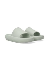 Green rubber sandals feature a wide open top, textured upper, and a thick sole with a ridged pattern for grip and comfort.