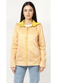 Chaqueta ligera con capucha en amarillo con estampado de leopardo, que cuenta con un cierre de cremallera frontal, bolsillos laterales y puños elásticos. Textura suave.