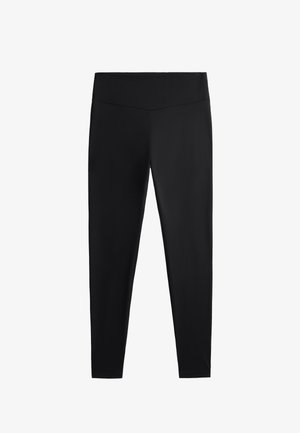 Leggings noirs en tissu lisse et extensible. Dotés d'une taille large et d'un design de jambe fuselée, adaptés pour une utilisation active ou décontractée.