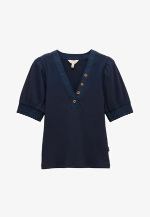 Granatowa, krótko rękawowa bluzka z dekoltem w serek, o rypsowym fakturze, zdobiona czterema brązowymi guzikami umieszczonymi na środku dekoltu. Detale marszczone na rękawach.