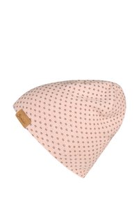 Light pink knit beanie with small dark polka dots and a brown leather brand tag on the side.
