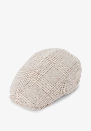 Cappello beige chiaro realizzato in tessuto testurizzato con un sottile motivo a quadri e strisce bianche e marroni. Forma arrotondata con profilo basso.