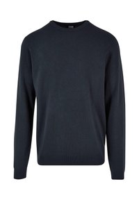 Marineblå genser med rund hals laget av myk stoff, med lange ermer, ribbestrikkede mansjetter og rett nederkant. Enkel, sømløs design.