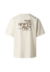 T-shirt crème avec le texte "THE NORTH FACE" et un graphique de montagne, incluant le slogan "NEVER STOP EXPLORING" au dos.