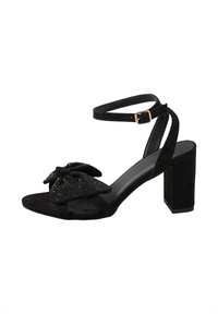Black suede ankle-strap sandal with block heel, adorned with a large bow decorated with small black rhinestones on the toe strap.
