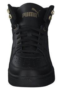 Svarte høy-top sneakers med lær øvre, perforert tå, gull løkker og logo på tunge. Har flate lisser og teksturert gummisåle.