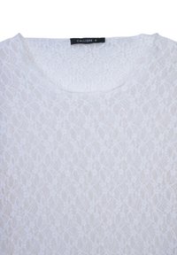 Top bianco in pizzo con motivo floreale, colletto rotondo e maniche corte. Etichetta con la scritta "CALLIOPE" taglia S. Tessuto leggero e semitrasparente.