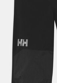 Helly Hansen JUNIOR GUARD PANT - Pantalones montañeros largos - black