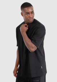 Smilodox OSKAR - Jednoduché tričko - schwarz
