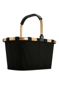 Schwarz geflochtener Korb mit einem goldenen Metallrahmen und einem gebogenen schwarzen Gummihandgriff. Verfügt über schwarze Akzentbänder und einen stabilen Fuß.