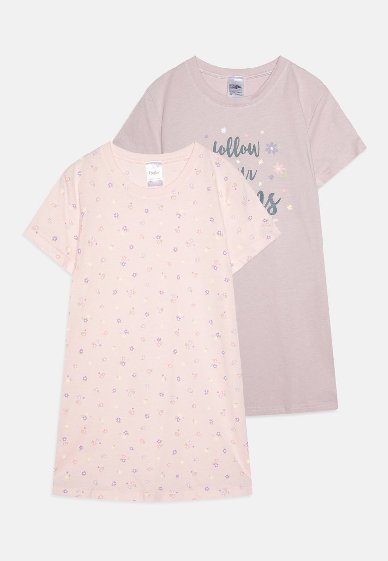 Two short-sleeved T-shirts, one light pink with floral patterns, the other soft gray with "follow your dreams" text in dark letters.