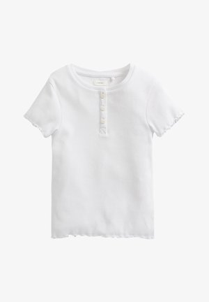 T-shirt bianca a maniche corte realizzata in tessuto ribbed, con collo rotondo, patta con tre bottoni e bordi ondulati.