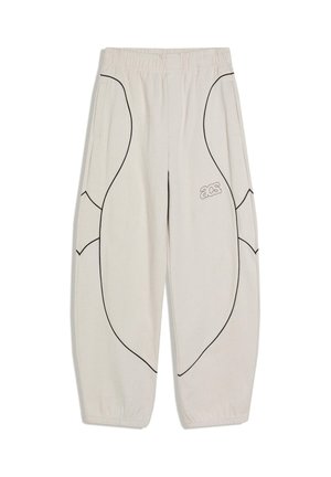 Svetlo bež trenirka s črnimi ukrivljenimi obrobami, elastičnim pasom in manšetami, stranskimi žepi ter majhnim logotipom "acs" na desni stegni.