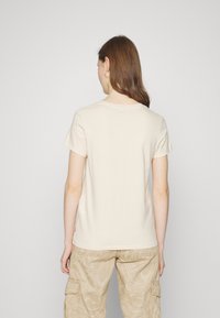 Levi's® THE PERFECT TEE - T-shirt estampada - light yellow
