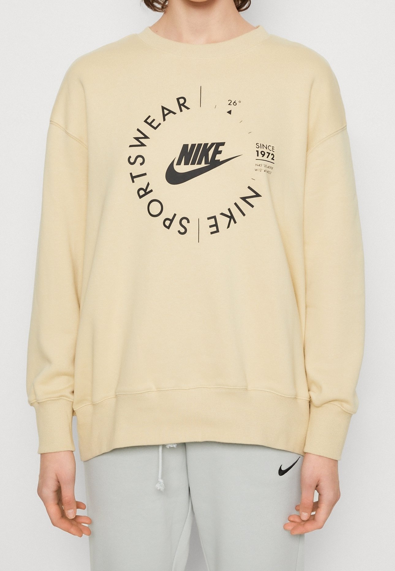 nike swoosh beige sweatshirt