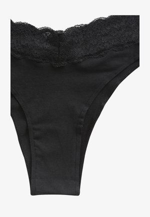 String noir en tissu doux, avec une ceinture en dentelle florale, une texture lisse et des bords cousus.