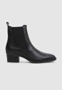 Black leather ankle boot with elastic side panels, a rounded toe, and a low, block heel. Smooth texture enhances its sleek design.