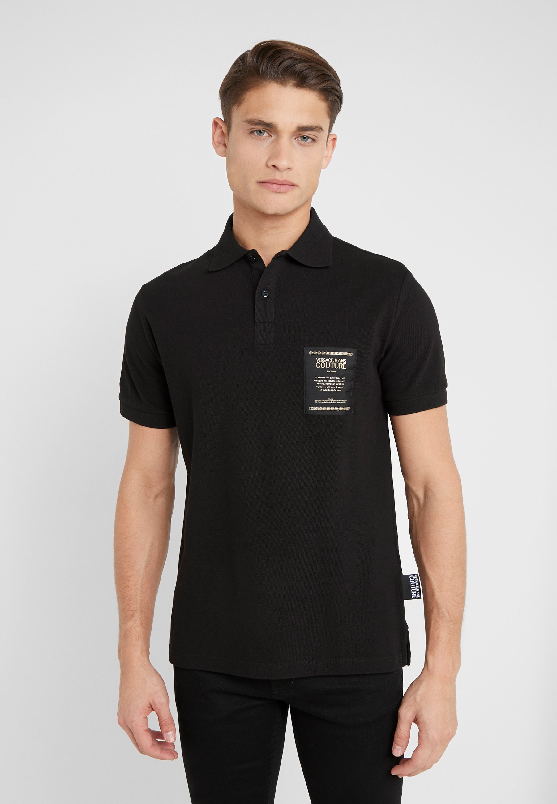 Versace Jeans Couture LABEL POLO Poloskjorter black Versace Jeans Couture CREW LABEL LOGO - Sweatshirt - black