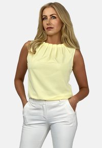 Top - light yellow