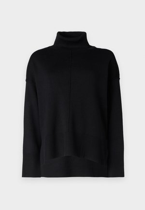 Black turtleneck sweater with ribbed texture, loose fit, and dropped shoulders. Features horizontal seam detail and ribbed cuffs and hem.