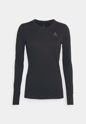 Black long-sleeve shirt made of soft fabric. Features a round neck, fitted design, and subtle logo on the chest. Smooth texture.