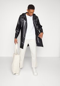 Rains LONG JACKET UNISEX - Parca - shinny black