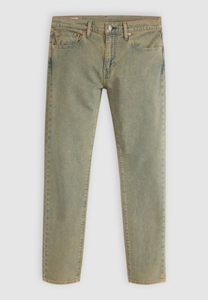 Light green denim jeans with a straight leg design. Features front and back pockets, copper rivets, and beige stitching.