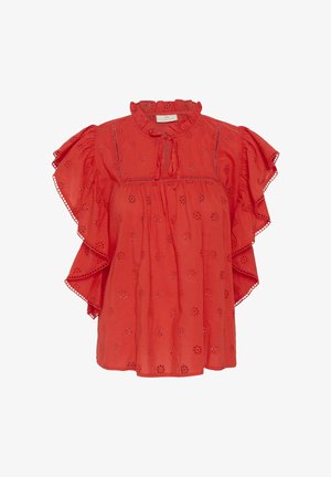 Red eyelet blouse with ruffled collar, tie front, flutter sleeves, and floral cutout embroidery on lightweight fabric.