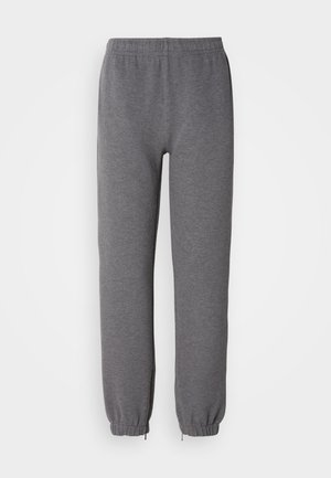 Grå, elastisk midje sweatpants med smalnende ben og mansjetter; laget av mykt, teksturert materiale; har to sidesømmer uten lommer.
