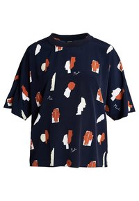 Navy blue short-sleeve t-shirt featuring abstract face patterns in red, white, and cream. Round neckline, relaxed fit, soft fabric.