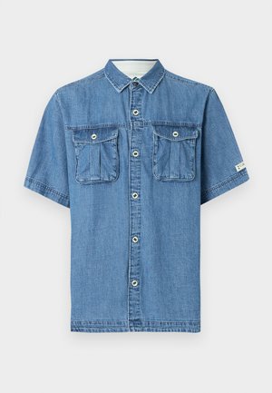 Blue denim short-sleeve shirt with button closure and two front flap pockets, displayed against a plain light background.