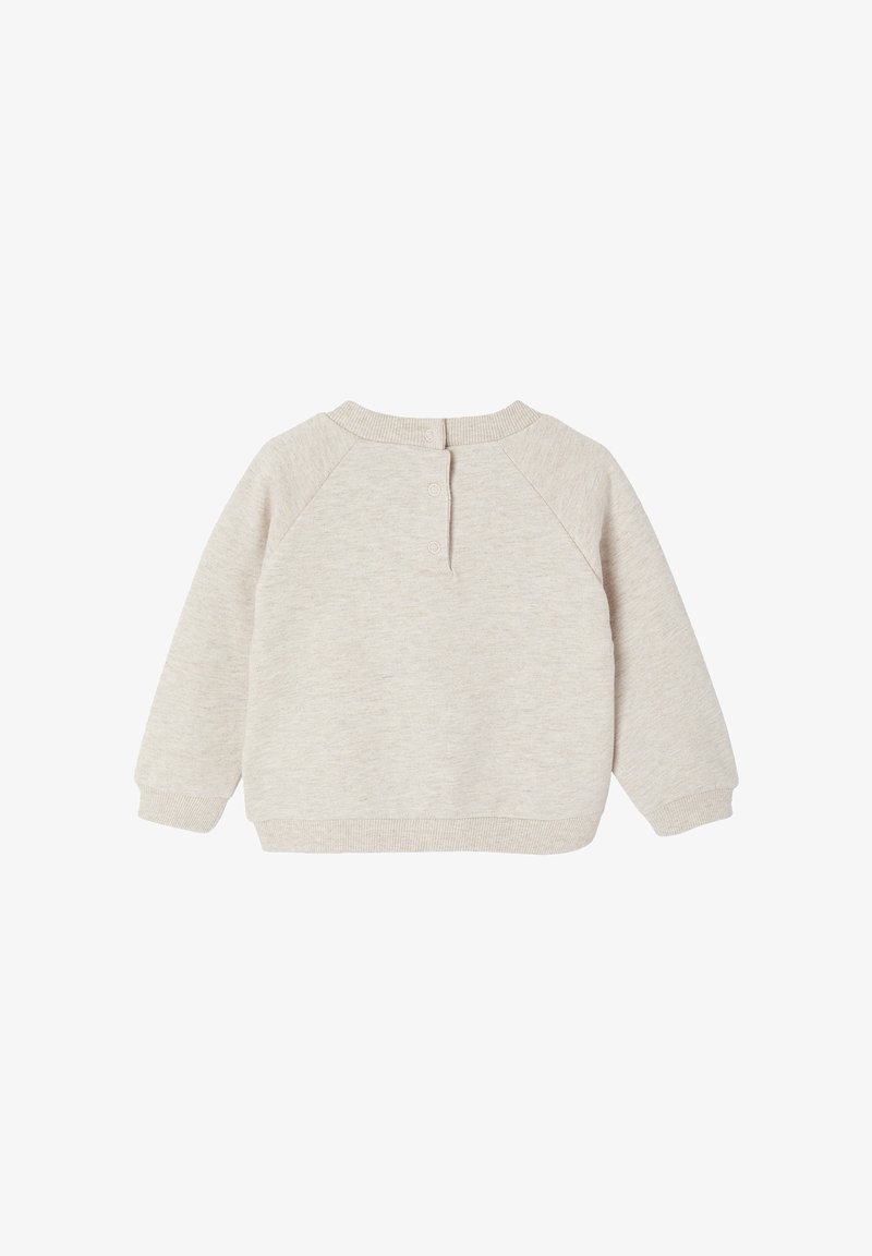 Helles beiges Sweatshirt mit Rundhalsausschnitt, Raglanärmeln und gerippten Bündchen. Der Rücken hat einen Knopfverschluss. Weicher, strukturierter Stoff.