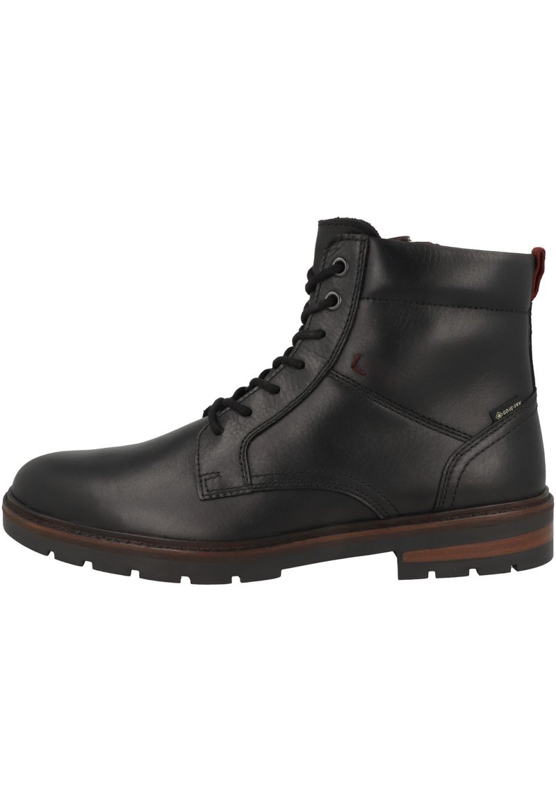 Botas de tobillo de cuero negro con diseño de cordones, cuello acolchado y suela de goma marrón. Presenta un logo discreto y una pestaña en la parte trasera.