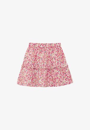 Jupe à volants à étages fleurie en rose clair avec un ourlet à volants. Le motif présente de petites fleurs en rose, violet et vert sur un fond blanc.