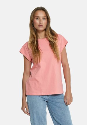 Short-sleeve, crew-neck t-shirt in light pink cotton. Features a relaxed fit with a simple design and no visible patterns or accents.