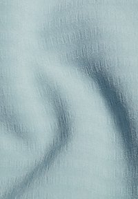 Light blue fabric with subtle embossed checkered texture and soft wrinkles creating shadow variations.